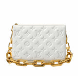 A white embossed Louis Vuitton shoulder bag with a signature monogram pattern and a chunky gold chain strap, shown against a plain white background.