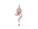 From the Chantecler Campanelle Collection, this jellyfish charm is crafted in 18kt yellow and white gold and adorned with diamonds, pink sapphires, and pink opal.