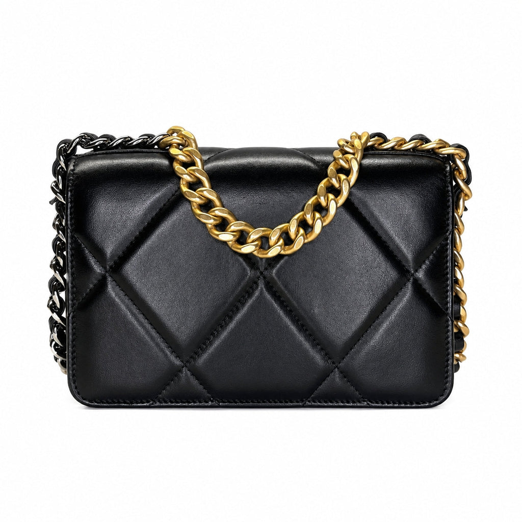 A black quilted leather shoulder bag with a gold chain link handle and a black metal chain shoulder strap, shown against a plain white background.