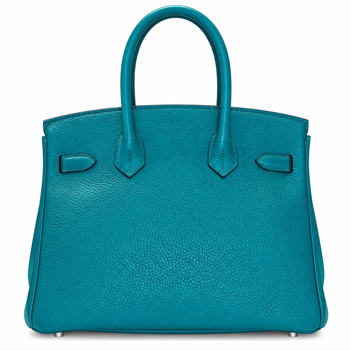 A structured turquoise leather handbag with dual top handles, silver-tone hardware, and small metal feet, photographed against a plain white background.