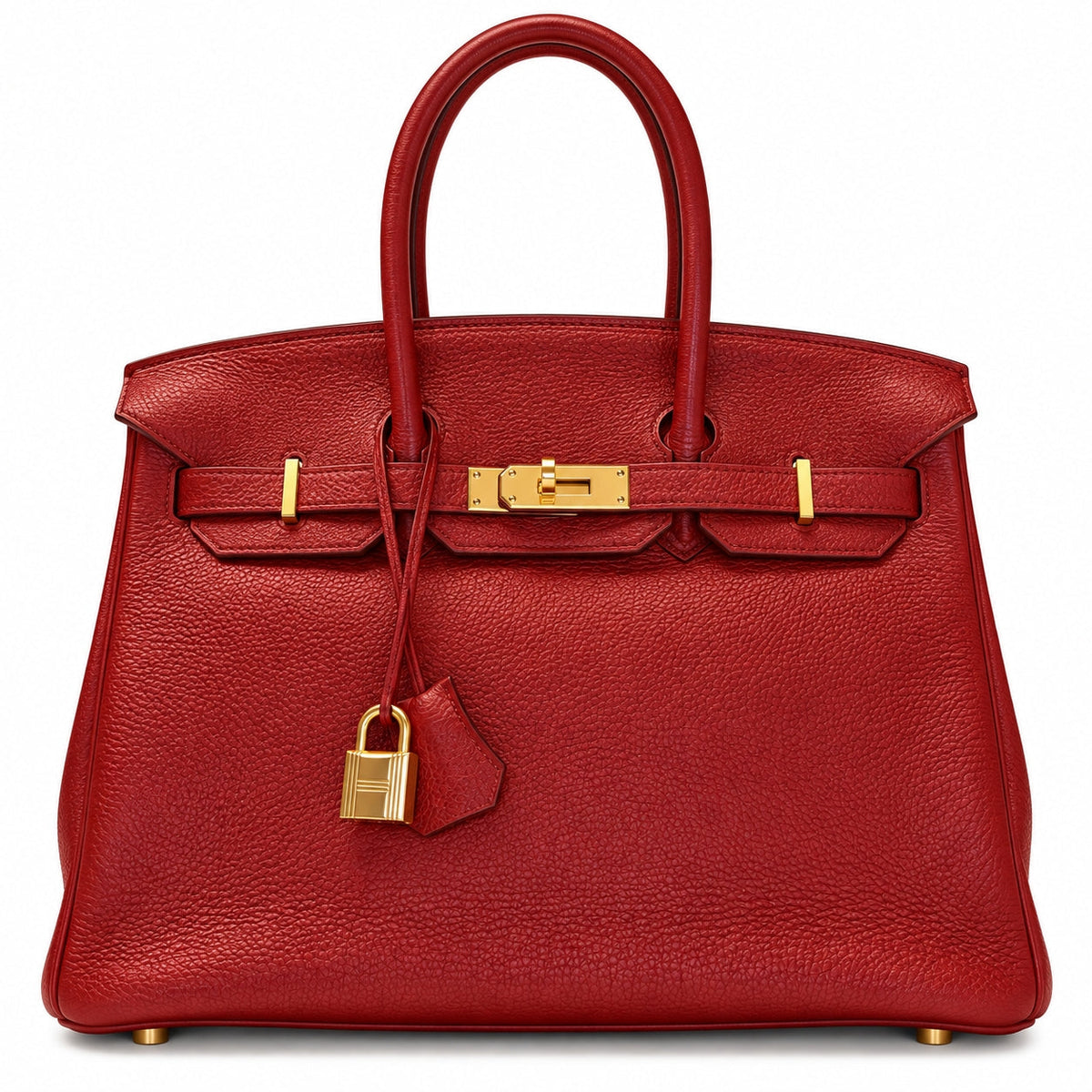 A red grained leather handbag with gold-tone hardware, featuring dual top handles, a front strap closure, and a hanging clochette lock, photographed against a plain white background.