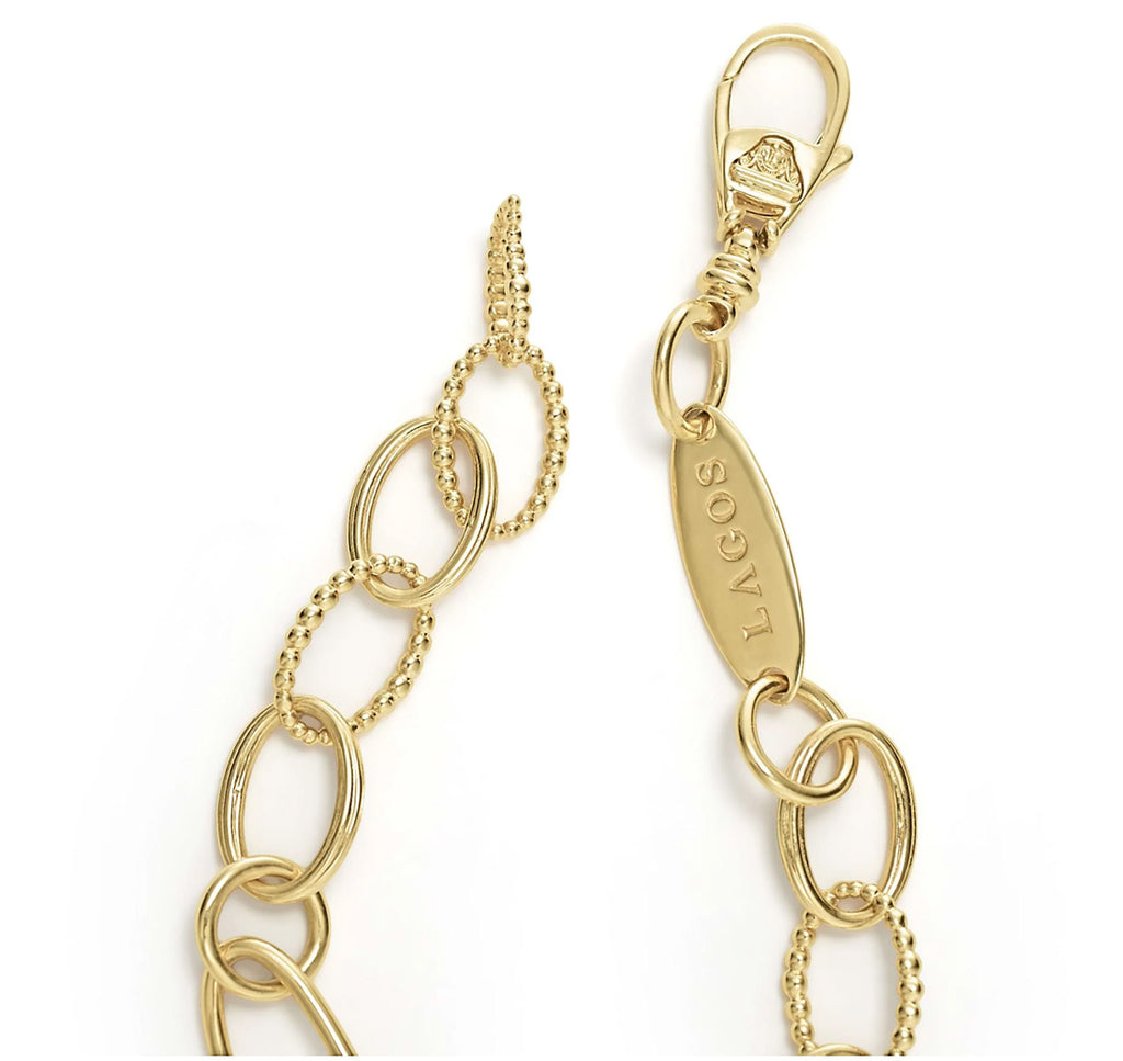 "Signature Caviar" 18kt Oval Gold Link Bracelet (7)