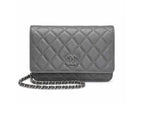 A gray quilted leather wallet with a silver-tone interlocking CC logo and a matching gray chain strap, shown on a plain white background.