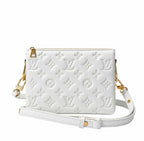 A white embossed Louis Vuitton shoulder bag with a signature monogram pattern and a chunky gold chain strap, shown against a plain white background.