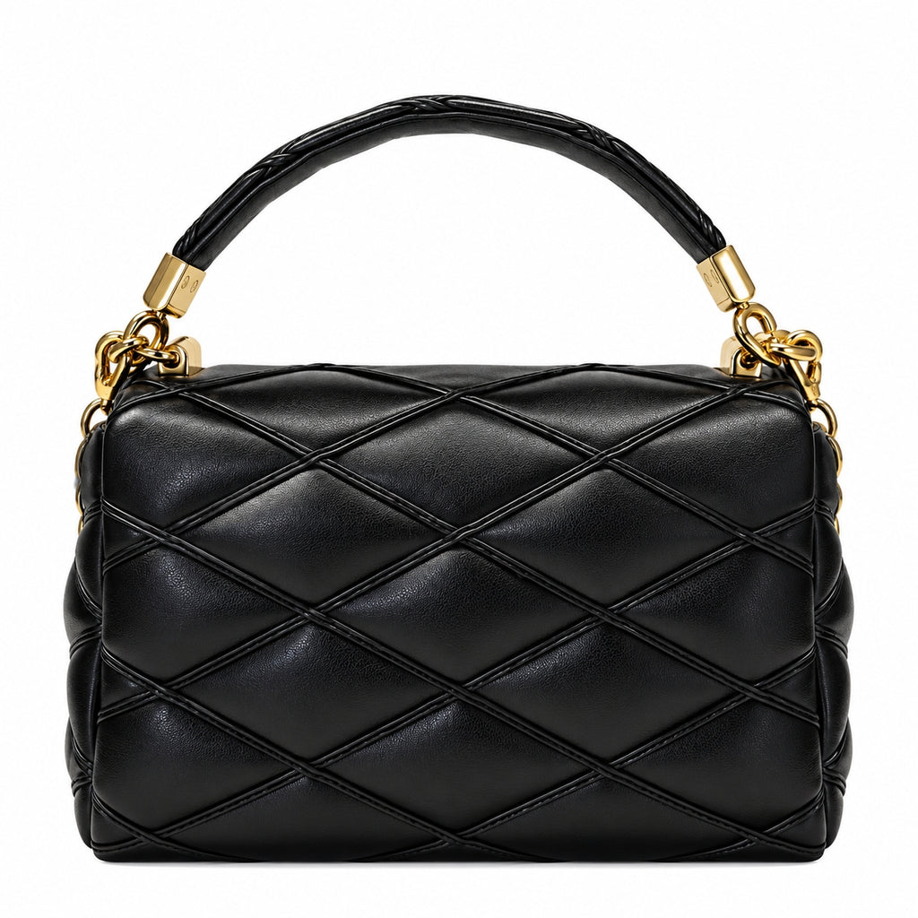 A black quilted leather handbag with a top handle and gold-tone chain accents, photographed against a plain white background.