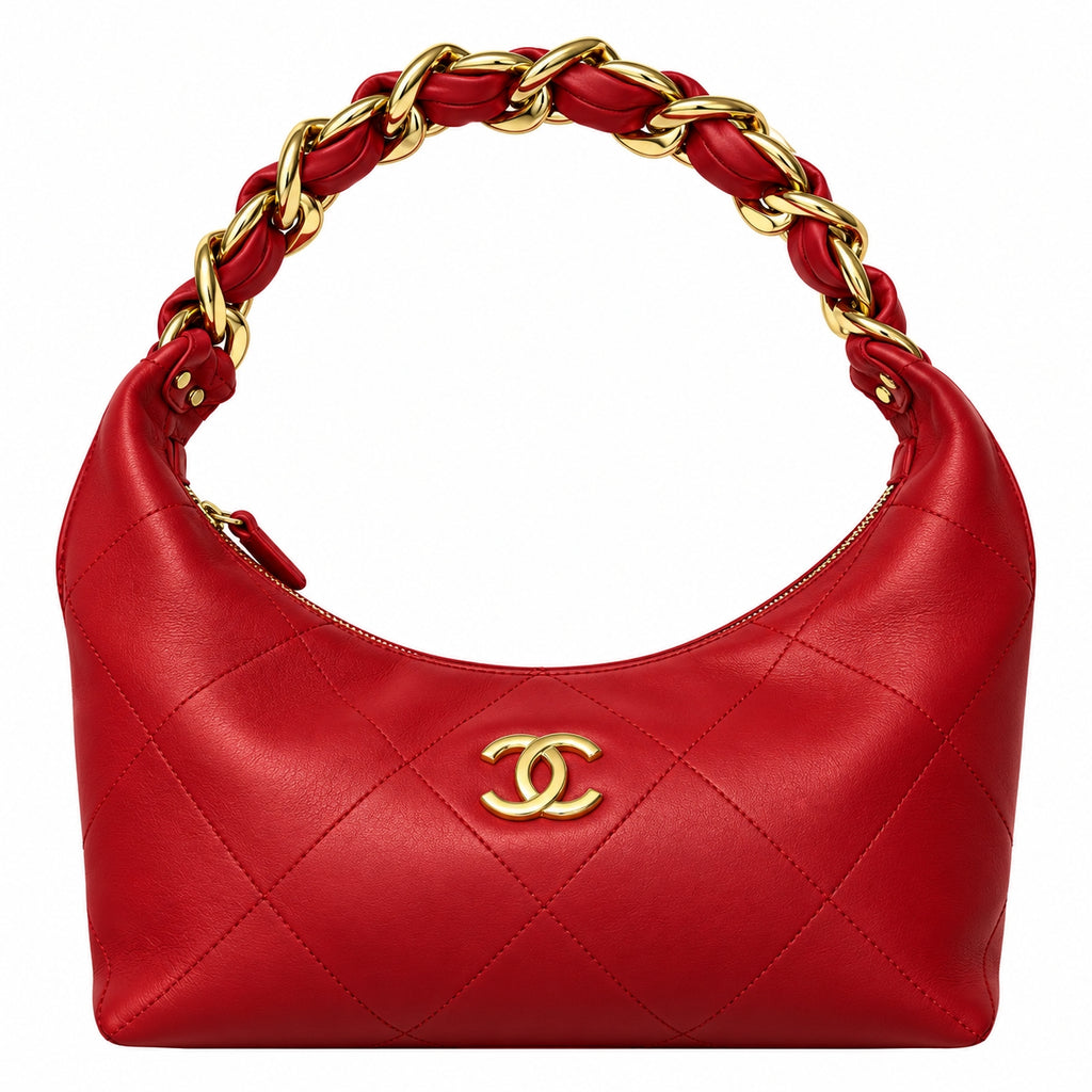 A red quilted leather shoulder bag with a gold-tone interlocking CC logo on the front and a braided chain handle, shown on a plain white background.