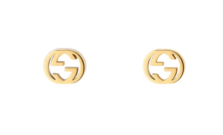 Gucci stud earrings in 18k yellow gold feature signature interlocking double G.